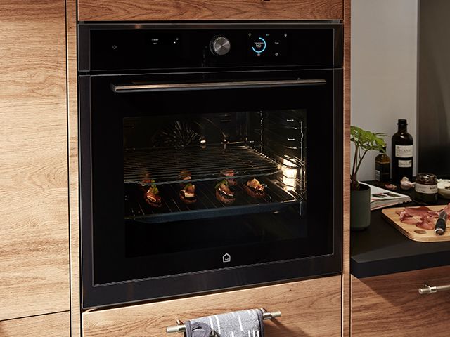 integrated oven - how to save on your electricity bills while working from home - inspiration - goodhomesmagazine.com