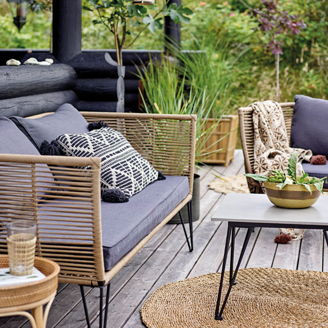 花园使用藤家具的空间为一个热带花园feeluse藤花园家具的空间为一个热带花园的感觉